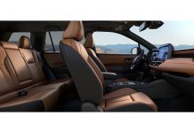 2026 Subaru Outback Wins Wards 10 Best Interiors Award in First Year of Redesign 2026 Subaru Outback interior featuring tan and black leather seats, steering wheel, and dashboard with mountains visible thr…
