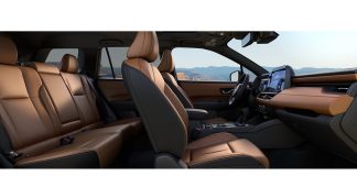 2026 Subaru Outback Wins Wards 10 Best Interiors Award in First Year of Redesign 2026 Subaru Outback interior featuring tan and black leather seats, steering wheel, and dashboard with mountains visible thr…