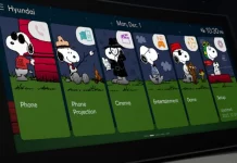 Hyundai Expands OTA Display Themes to Tucson, Santa Fe, IONIQ 5 Hyundai infotainment display screen showing Bluelink Store app menu with Snoopy-themed customization options for Phone, Cine…