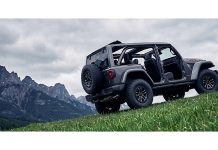 Jeep Wrangler Rocky Mountain 392 Adds Canadian Flair to 470-HP V8 Formula 2027 Jeep Wrangler Rocky Mountain 392 parked on grassy hillside with doors open, mountain peaks visible in background under…
